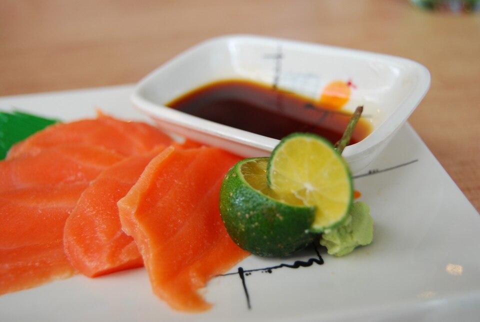 raw salmon with soy sauce